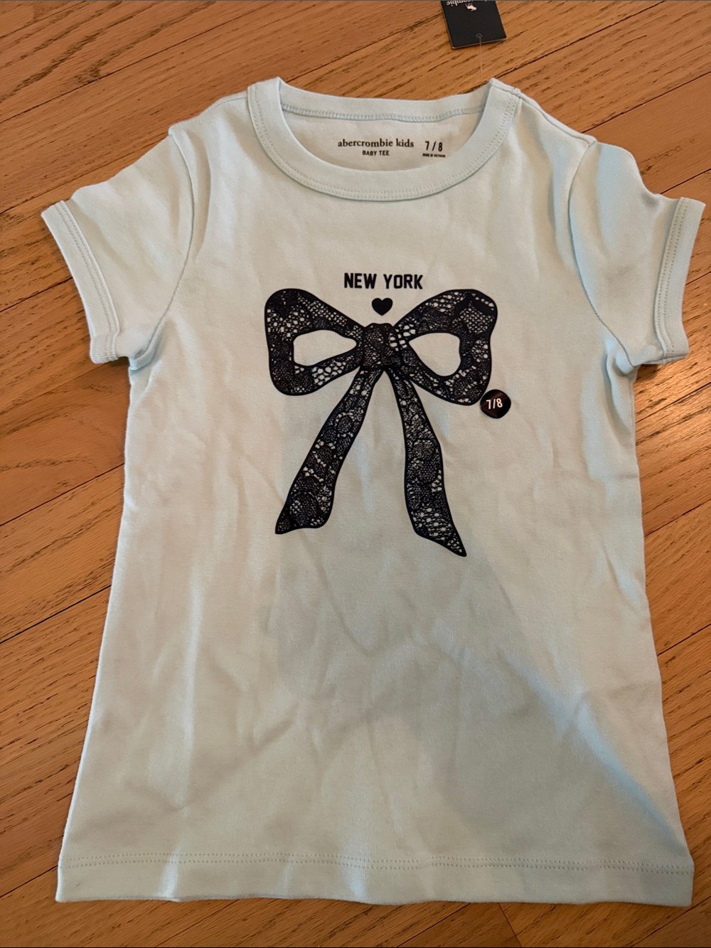 abercrombie kids light blue tee with black lace bow